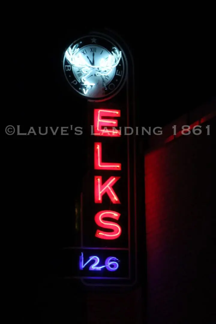 Elks neon sign in red color on a black background