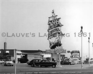 A black and white photo of a sign for lauve's motel.