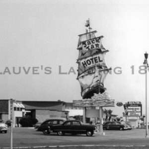 A black and white photo of a sign for lauve's motel.