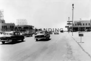 Cars cruising near the pier